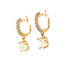 The Beautiful Drop Zirconia Stone Huggie earrings feature rose gold hoops embellished with small clear gemstones and larger square-shaped dangles, making them perfect for any skin type.